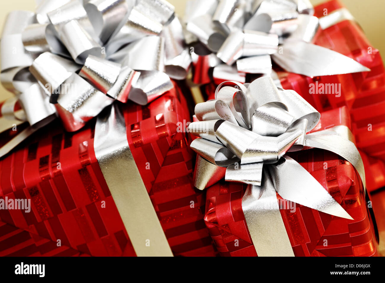 golden christmas gifts on gold background Stock Photo Alamy