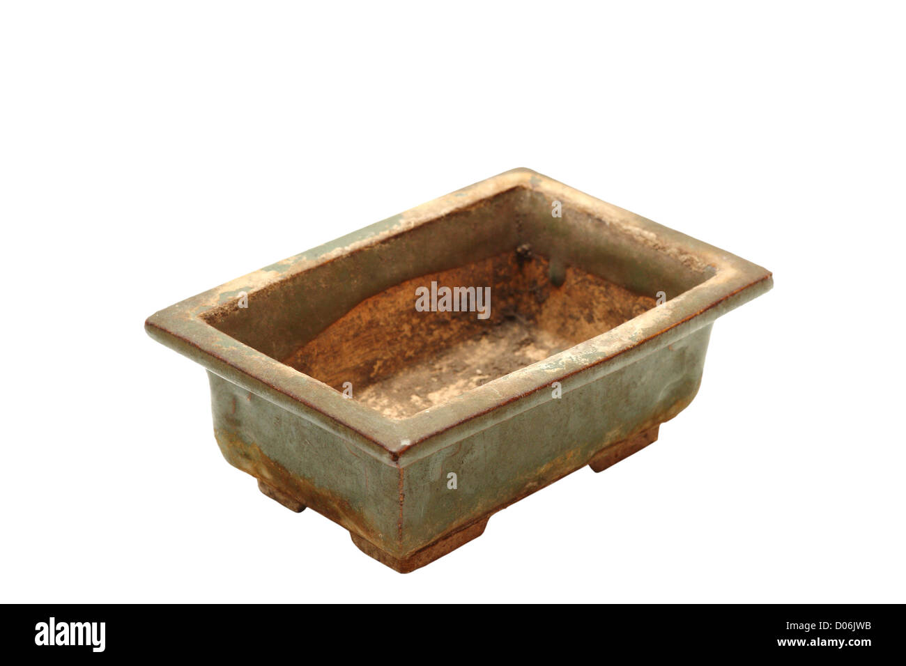 ancient japanese ceramic bonsai pot isolated on white background Stock