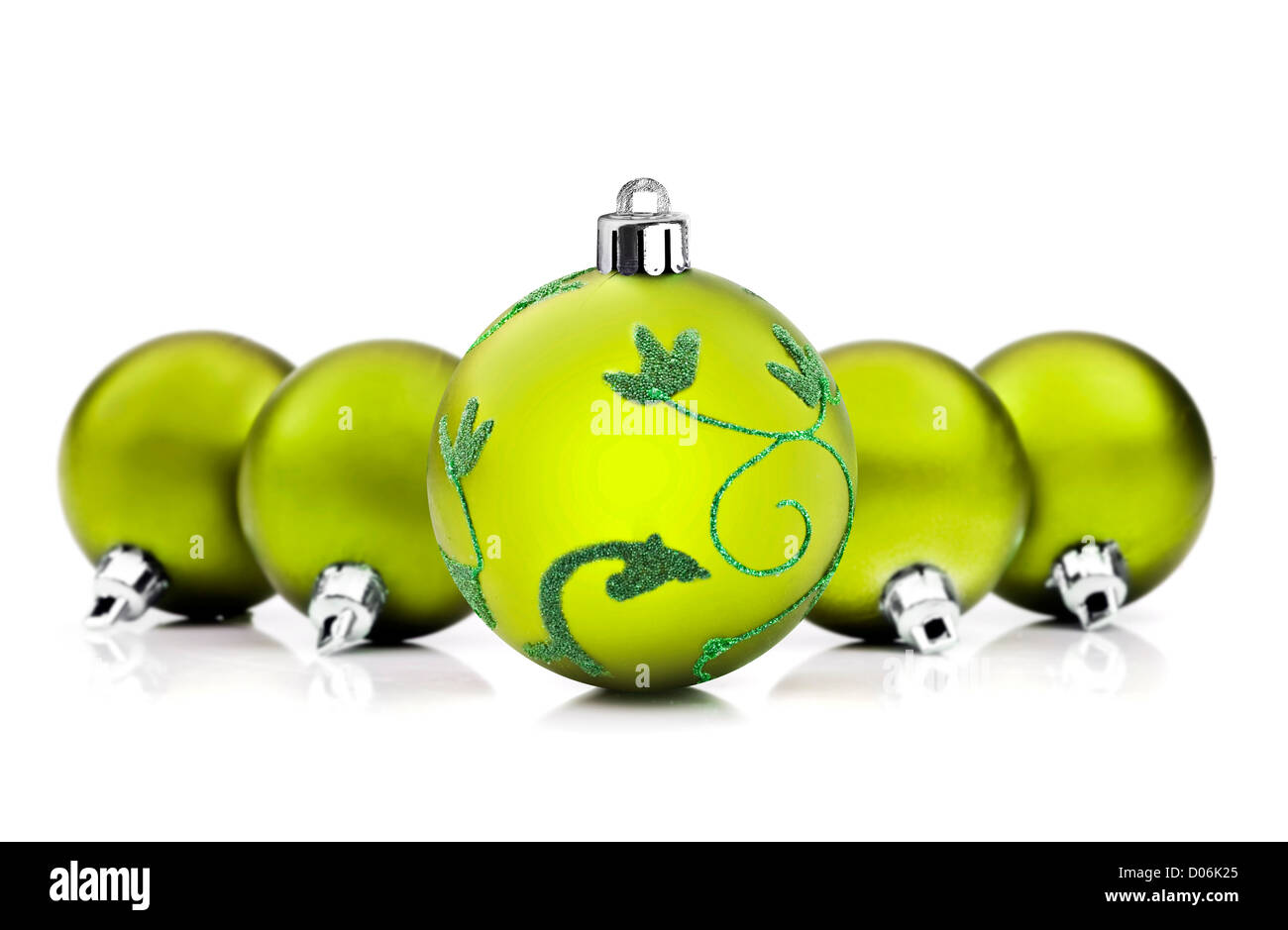Green christmas baubles on white background with space for text Stock Photo
