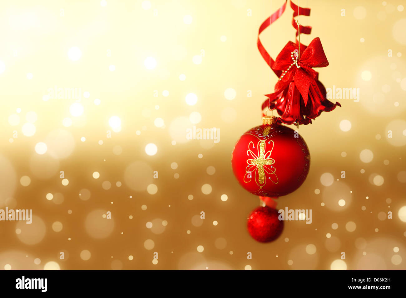 red christmas balls on gold background Stock Photo - Alamy
