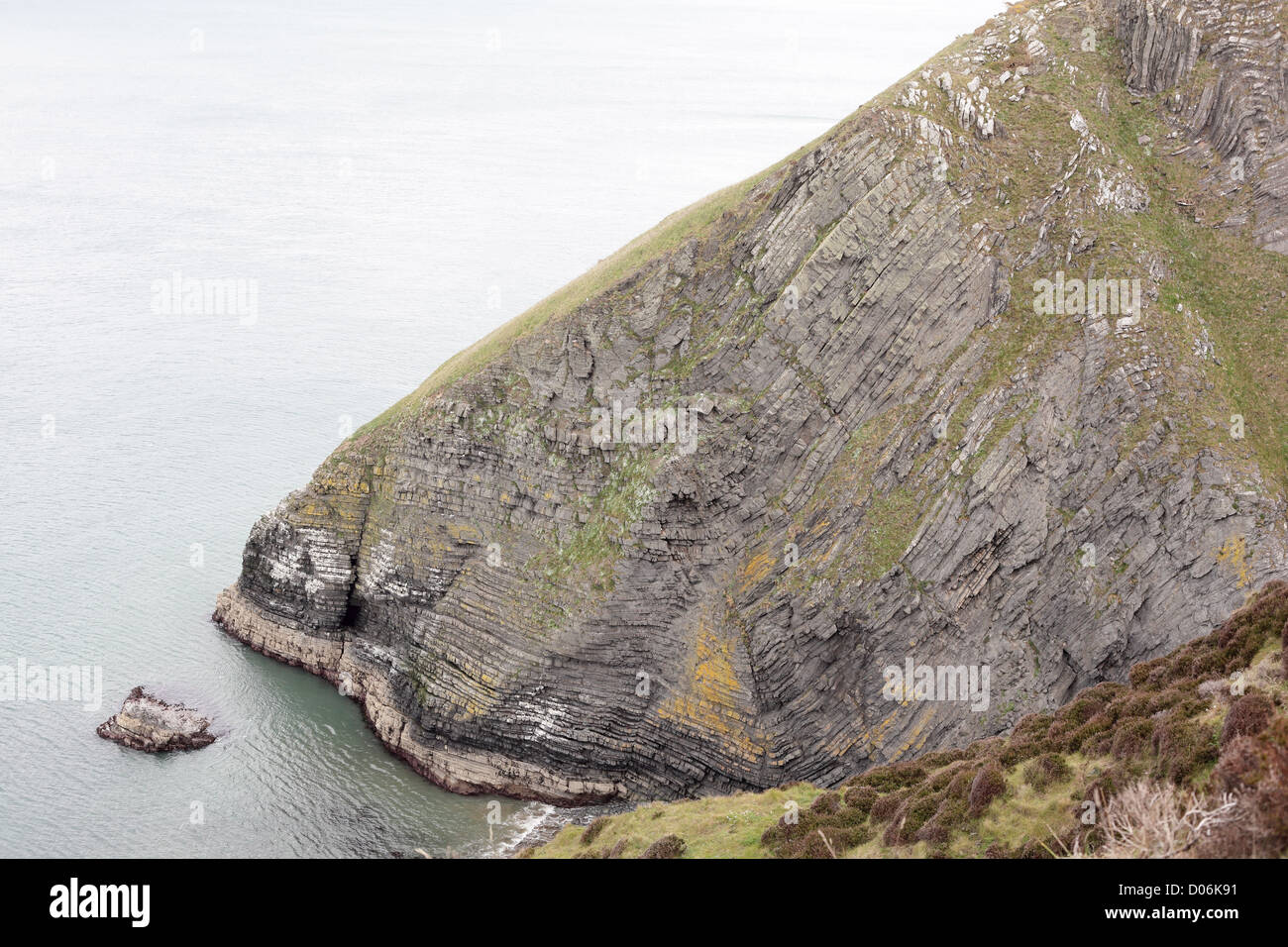 Layered and folded rocks on the south Cardigan Bay coast, near Ceibwr, South Wales, May 2012 Stock Photo