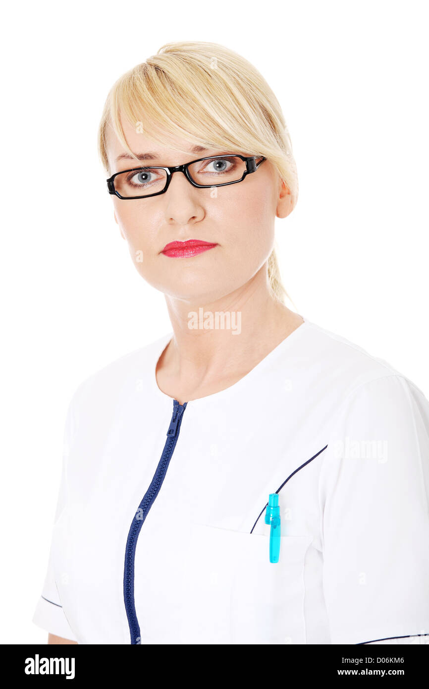 Mature female doctor or nurse isolated on white background Stock Photo ...