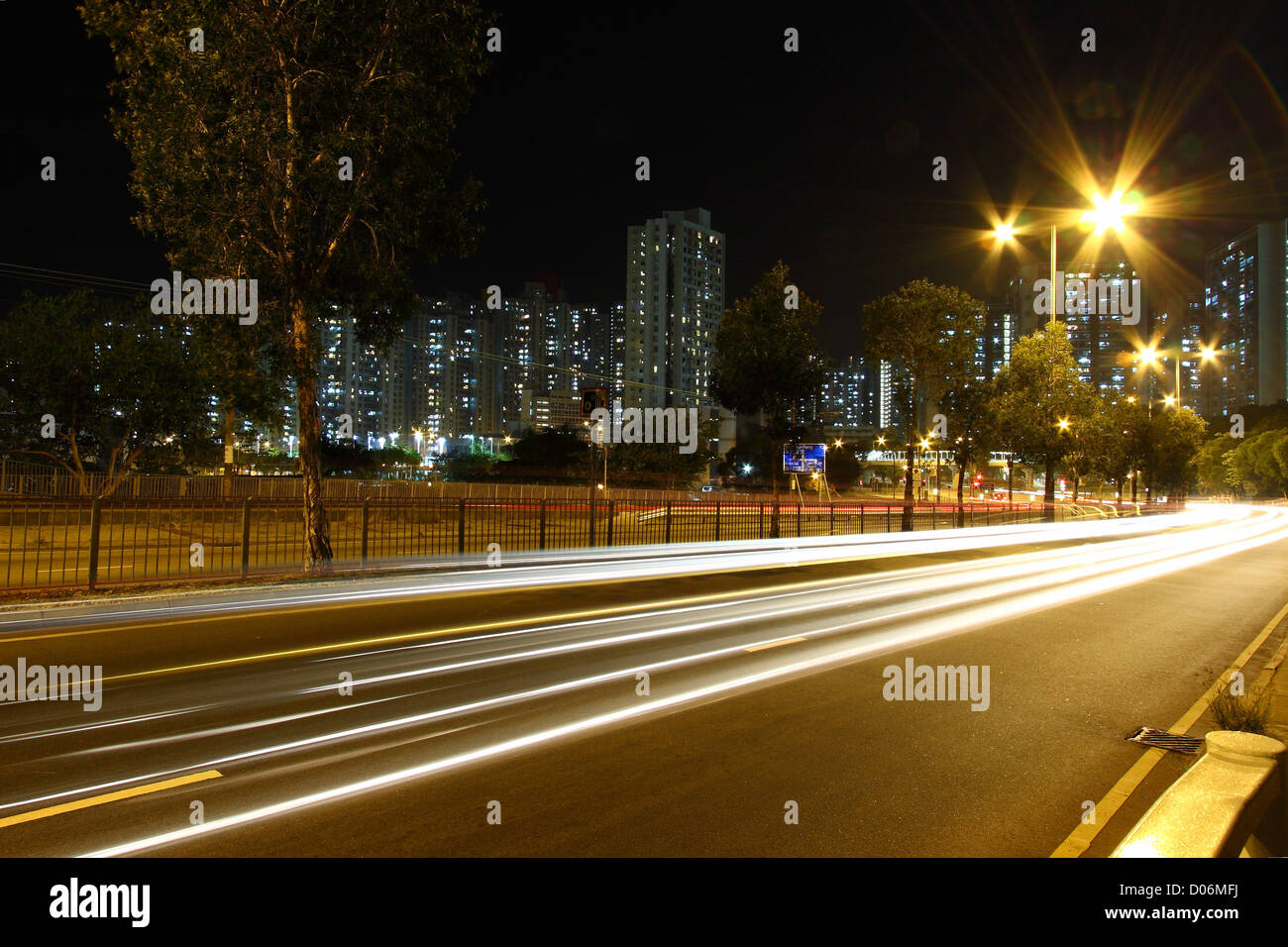 Traffic through downtown of Hong Kong at night Stock Photo - Alamy