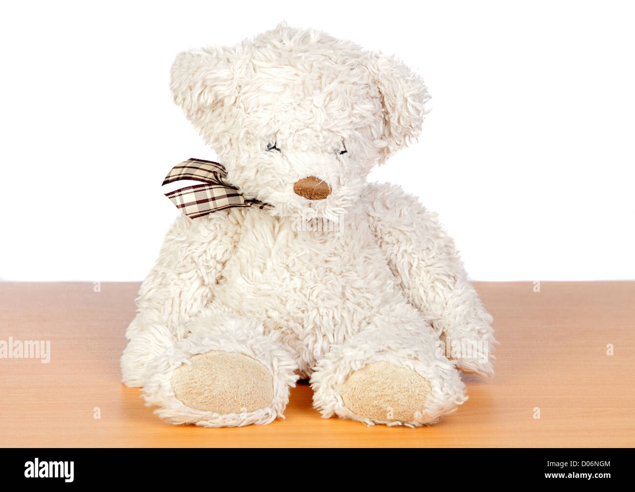 Brown teddy bear isolated on a over white background Stock Photo - Alamy
