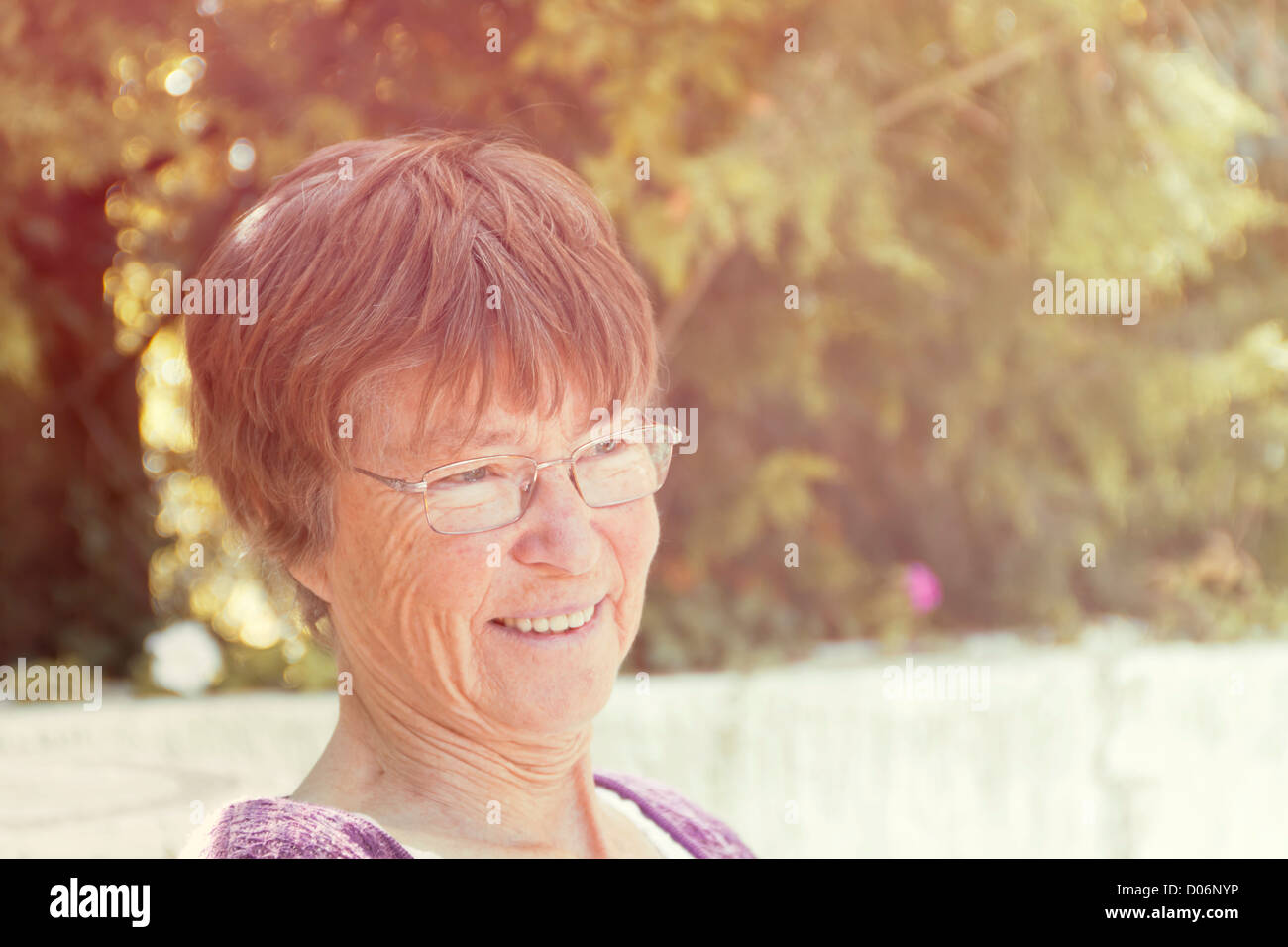 Woman sunlight outdoors hi-res stock photography and images - Alamy