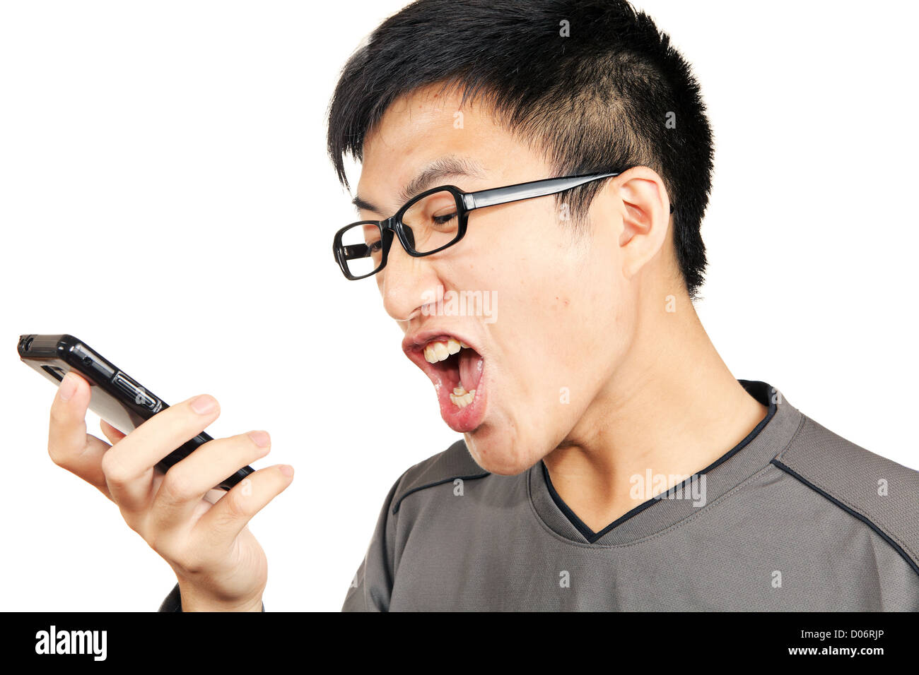 man yells to his phone Stock Photo