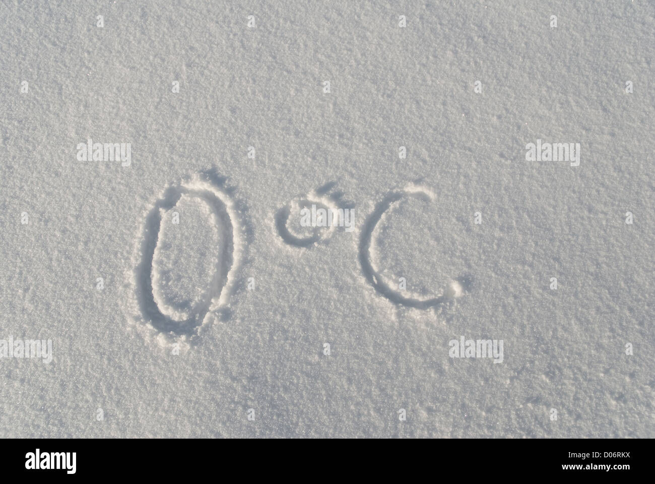 Zero degree Celsius imprint in snow Stock Photo