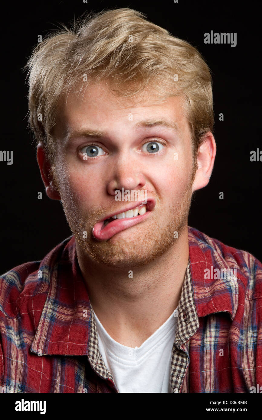 Young man making goofy face Stock Photo