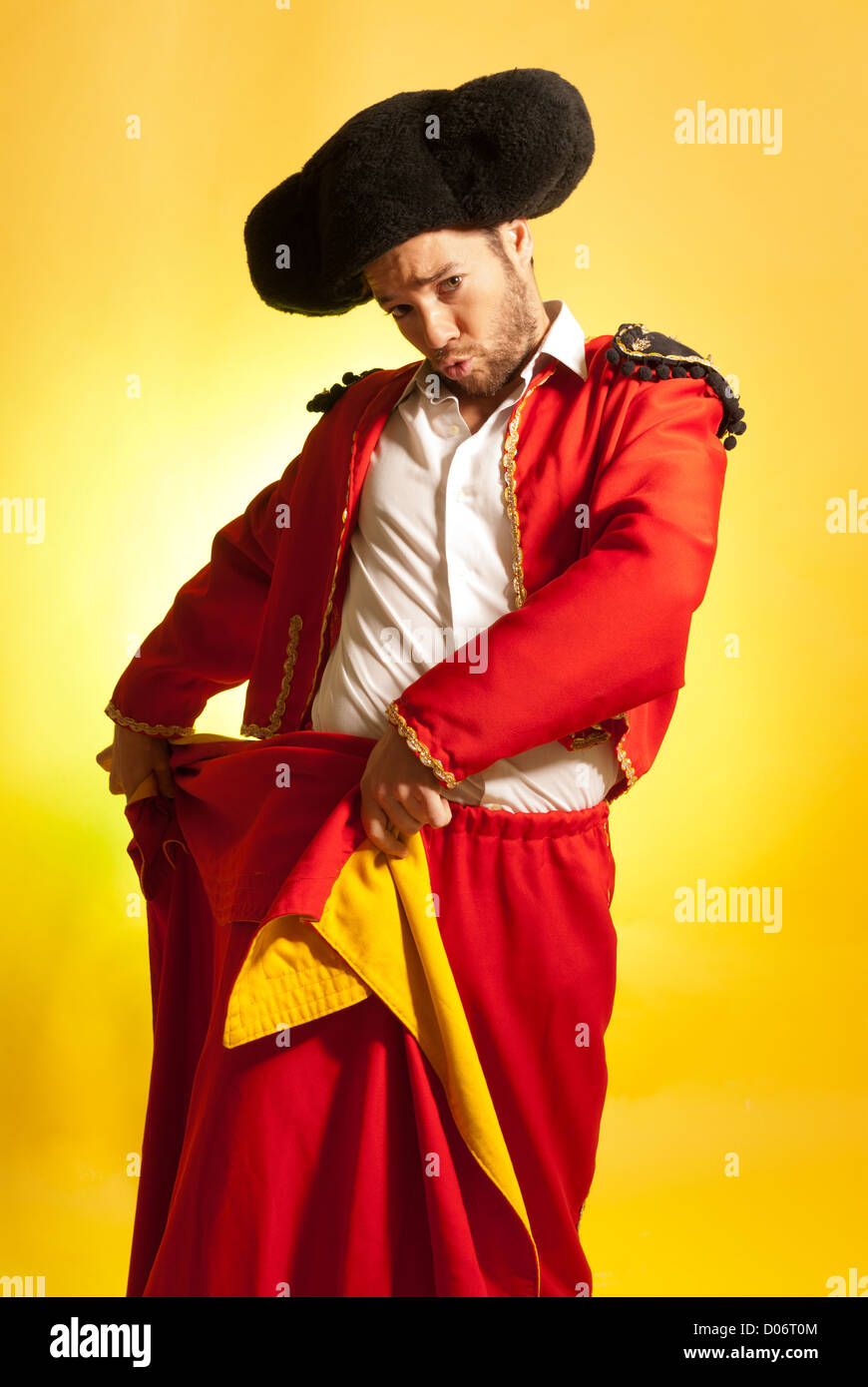 Bullfighter courage red yellow humor spanish colors Stock Photo