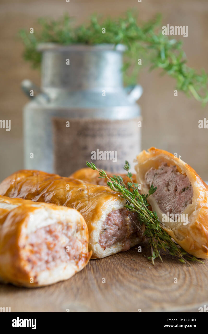 Sausage rolls and herbs Stock Photo Alamy