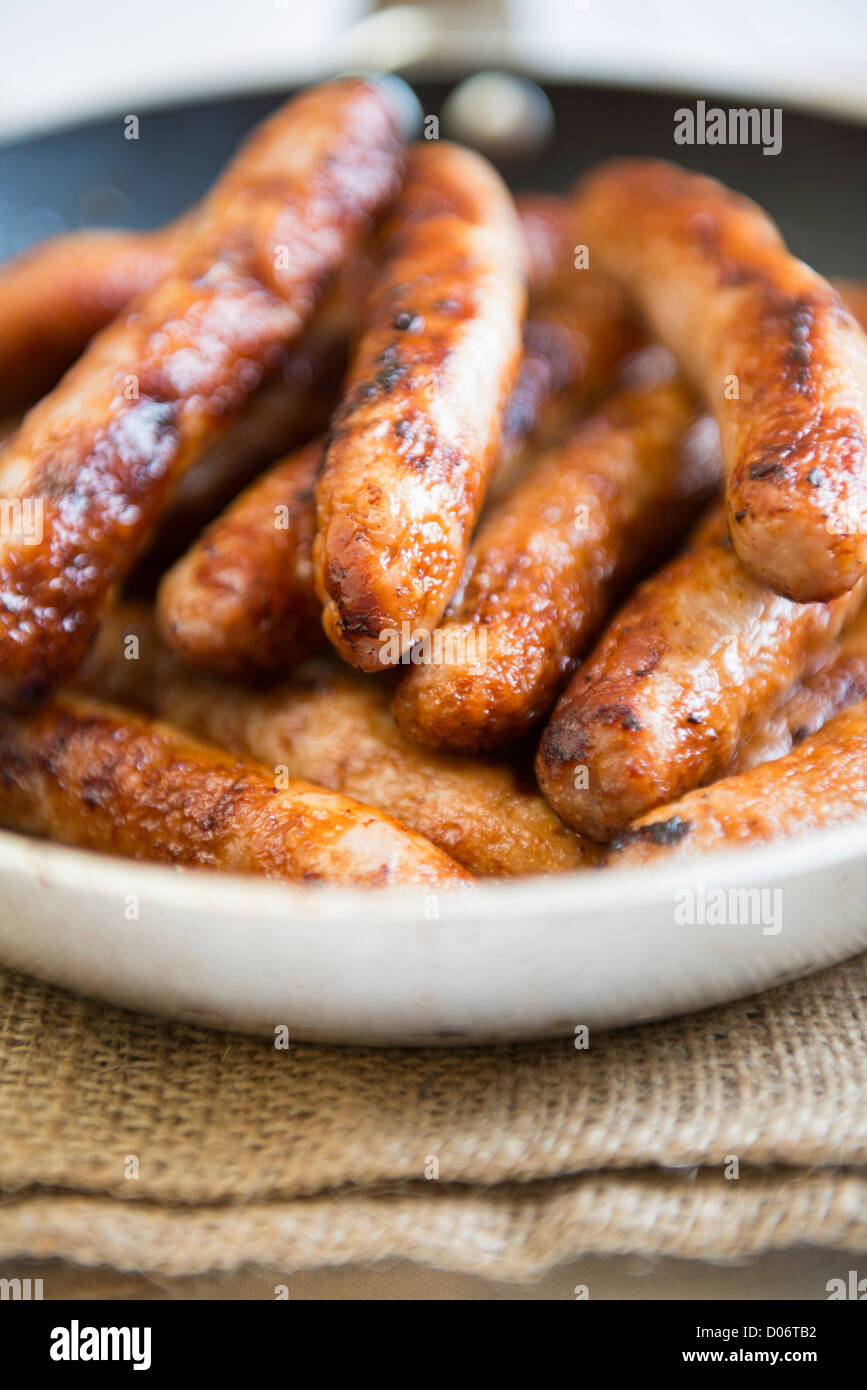Frying pan full of sausages Stock Photo Alamy