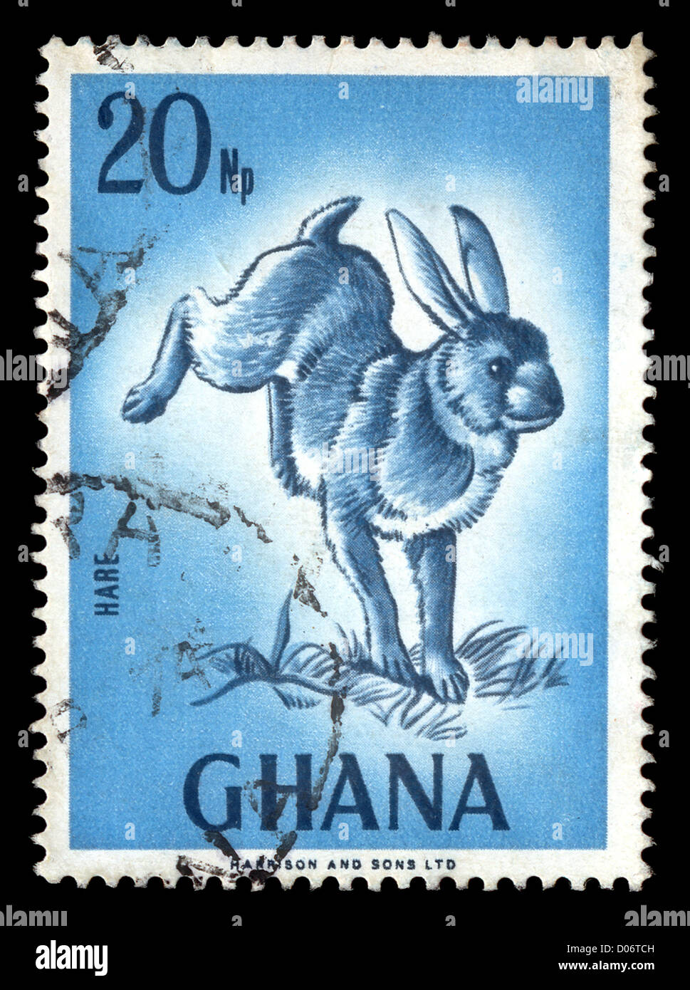 GHANA - CIRCA 1974. Vintage canceled postage stamp with wild rabbit illustration circa 1974. Stock Photo