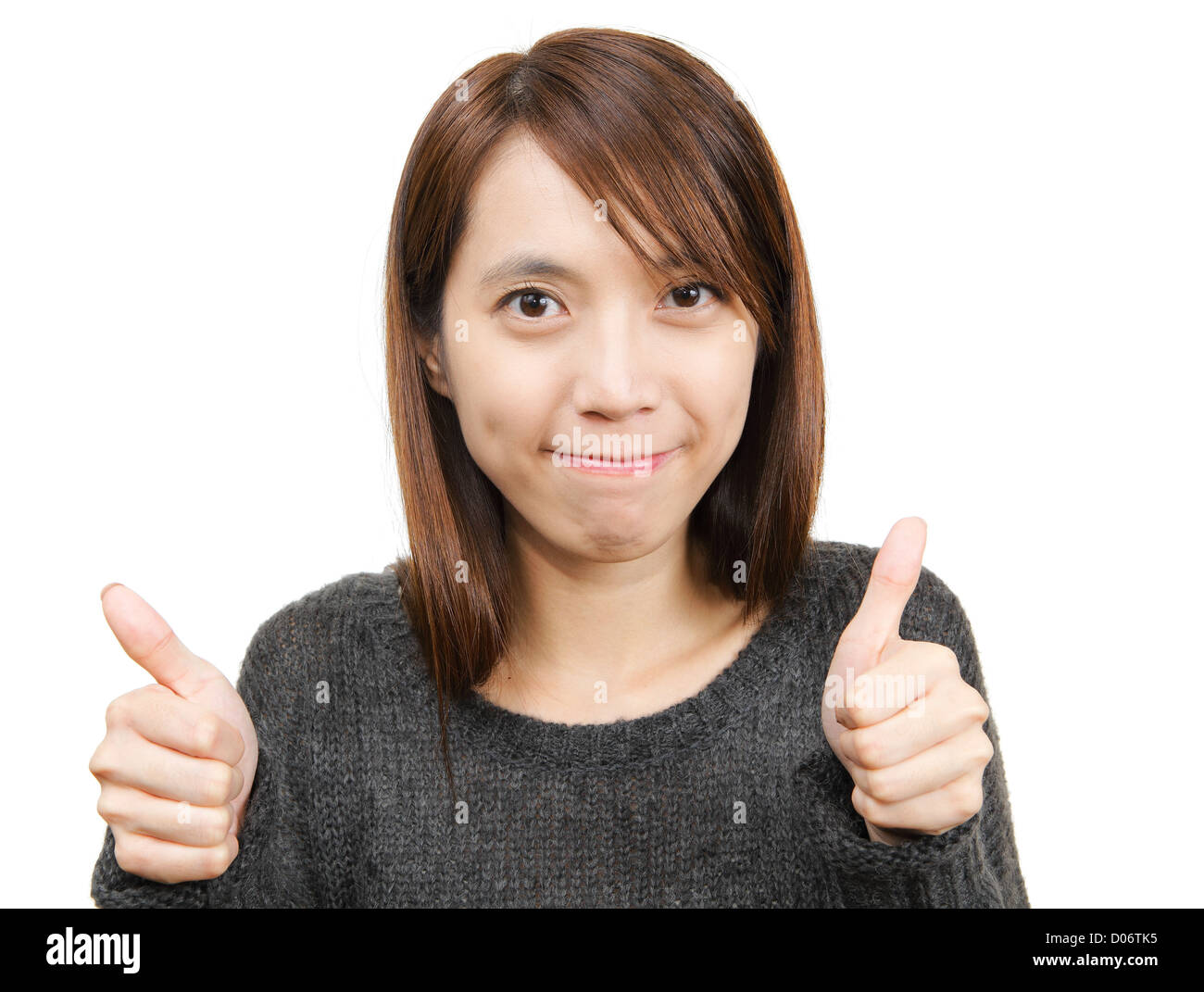 Smiling woman with thumbs up Stock Photo - Alamy