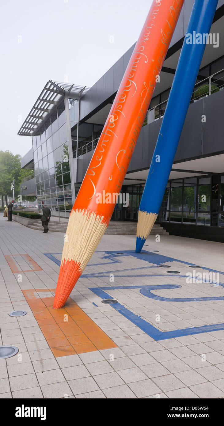 Giant pencils outside of the Volksbank in Braunschweig, Germany. These were designed by the artist Achim Frederic Kiel. Stock Photo