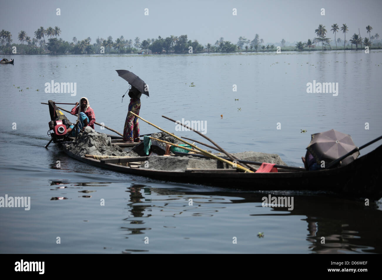 A Canoe converted into a small motor boat to carry goods across the