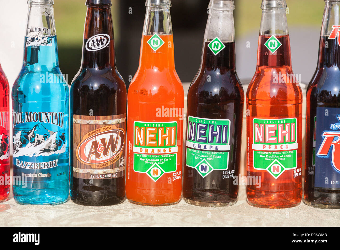 Bottles of classic Nehi, Cool Mountain, and A&W flavored soda soft drinks Stock Photo