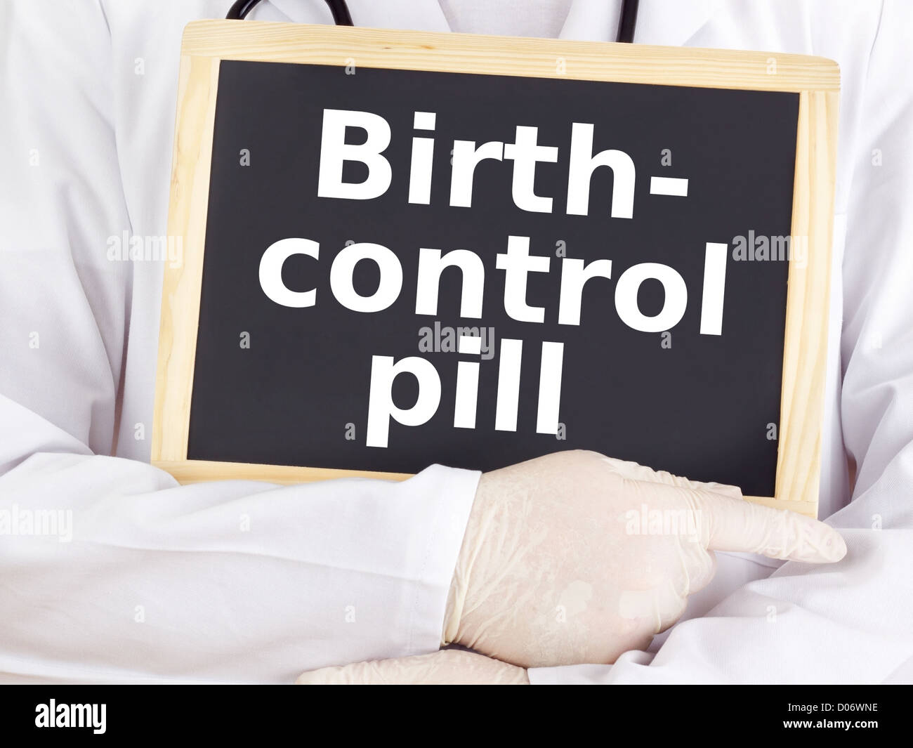 Doctor shows information: birth-control pill Stock Photo