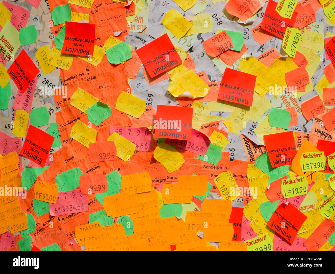 Hundreds of colourful price stickers forming a exhibit of modern art on the outside of a building in Hannover, Germany. Stock Photo