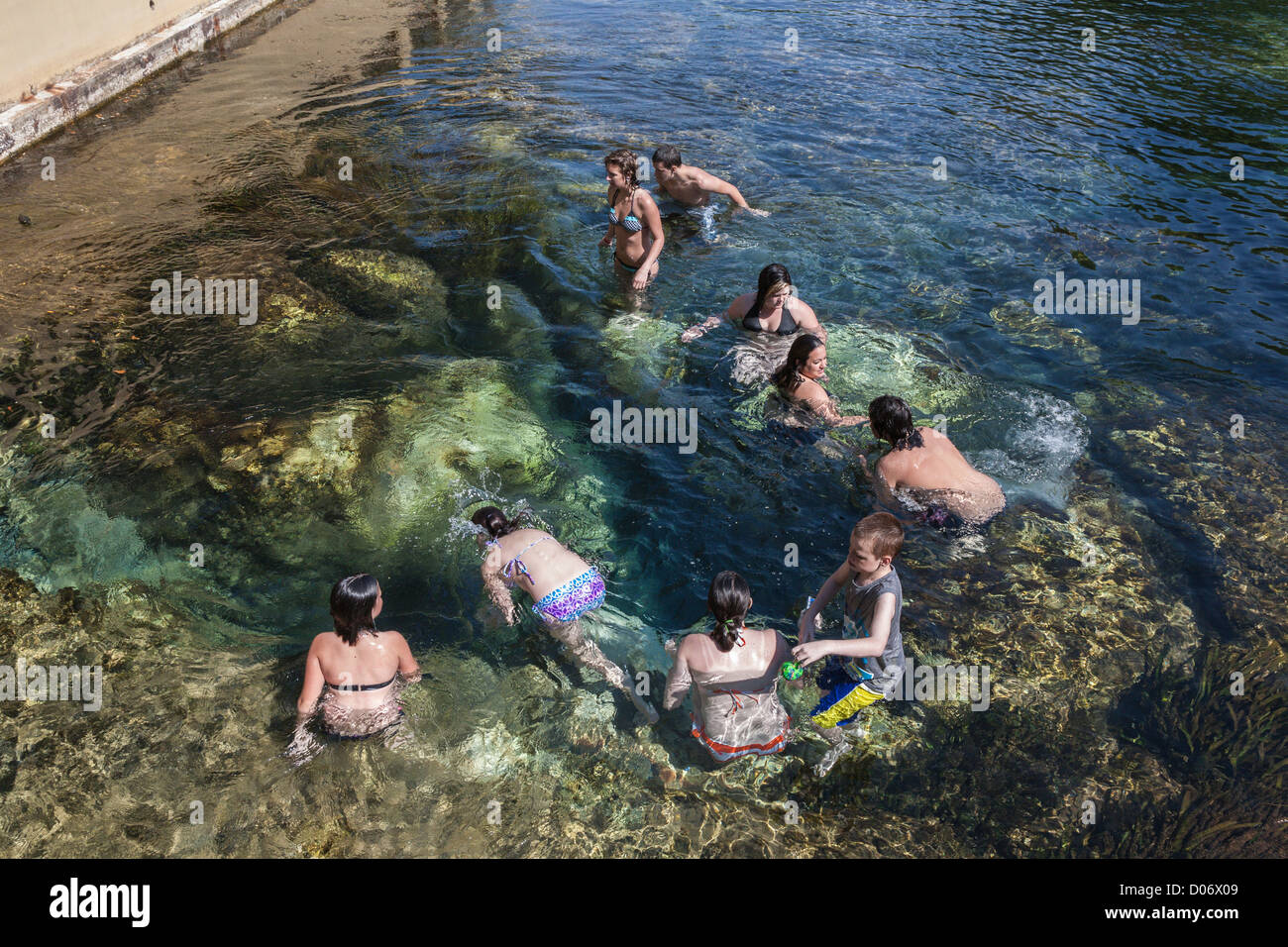 Teens swim and play at Salt Springs Recreation Area in the Ocala