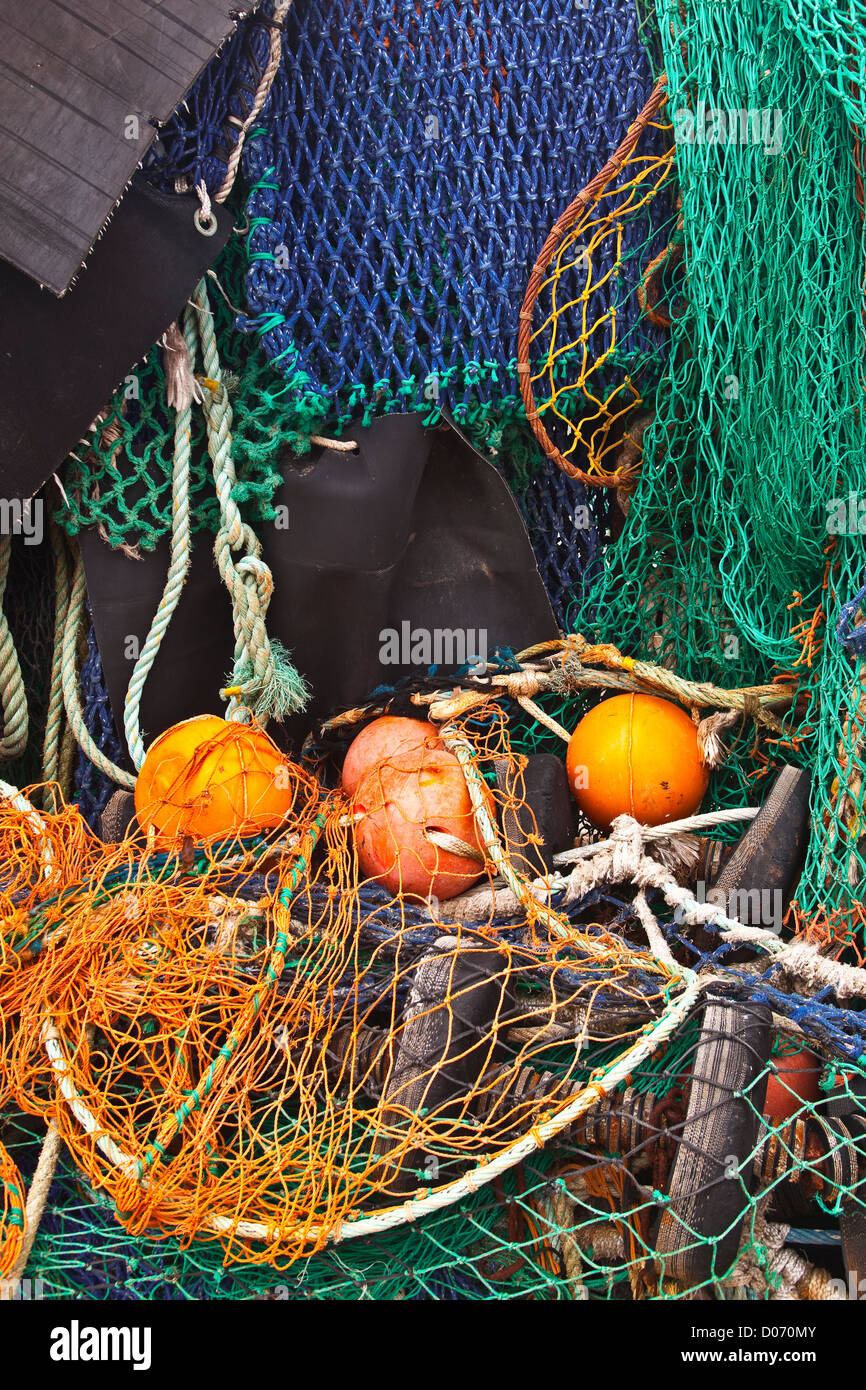 sea fish net or fishing net with small floats attached Stock Photo - Alamy
