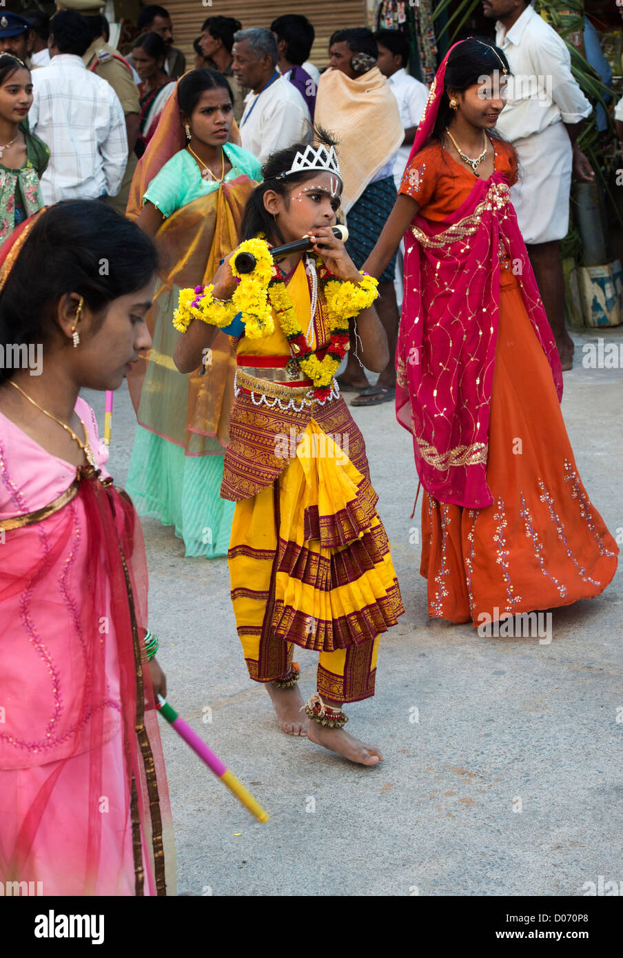 Indian girl dressed as Krishna at a festival in the streets of Puttaparthi. Andhra Pradesh, India Stock Photo