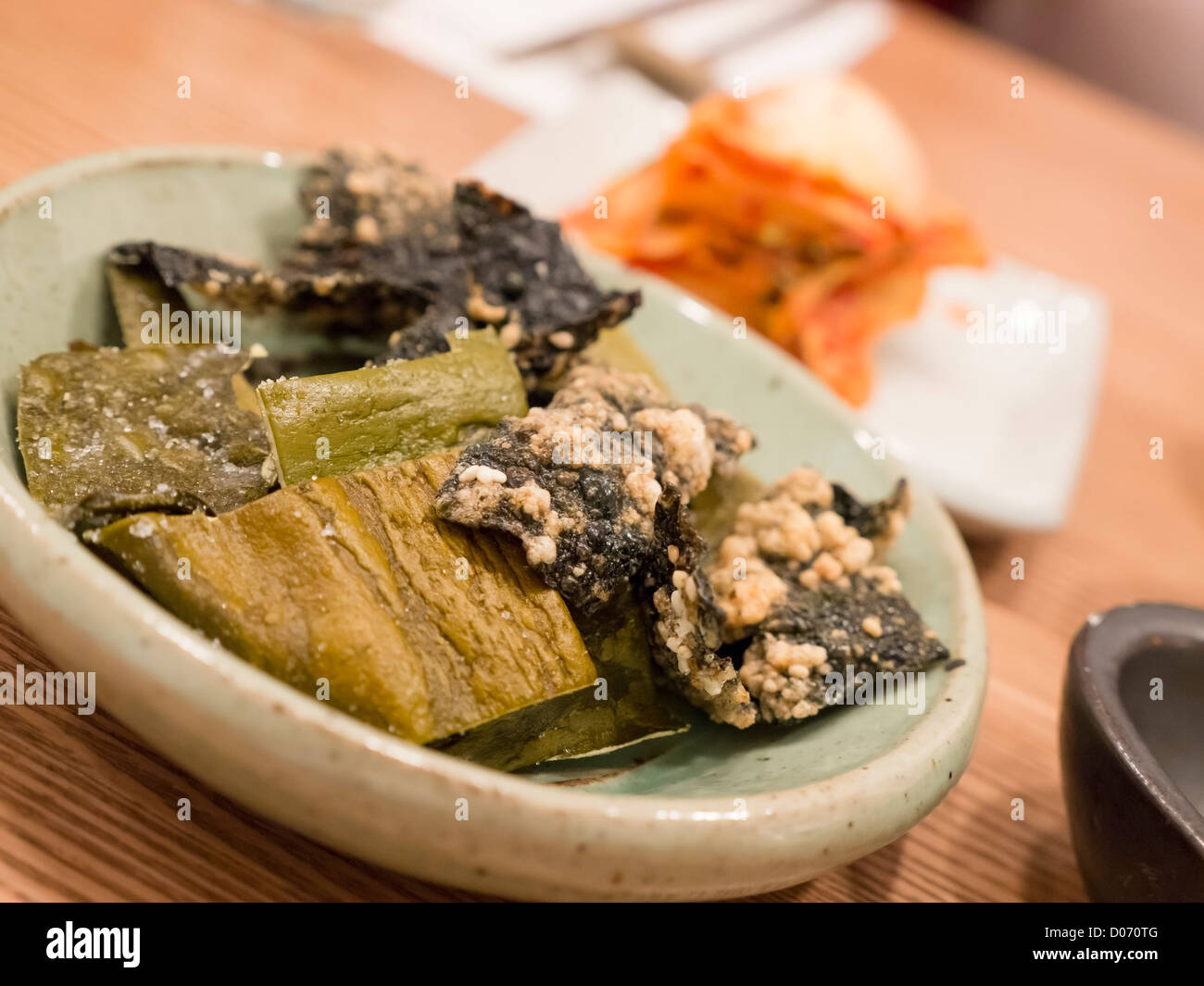 Kimchi and seaweed dishes in a South Korean restaurant. Stock Photo