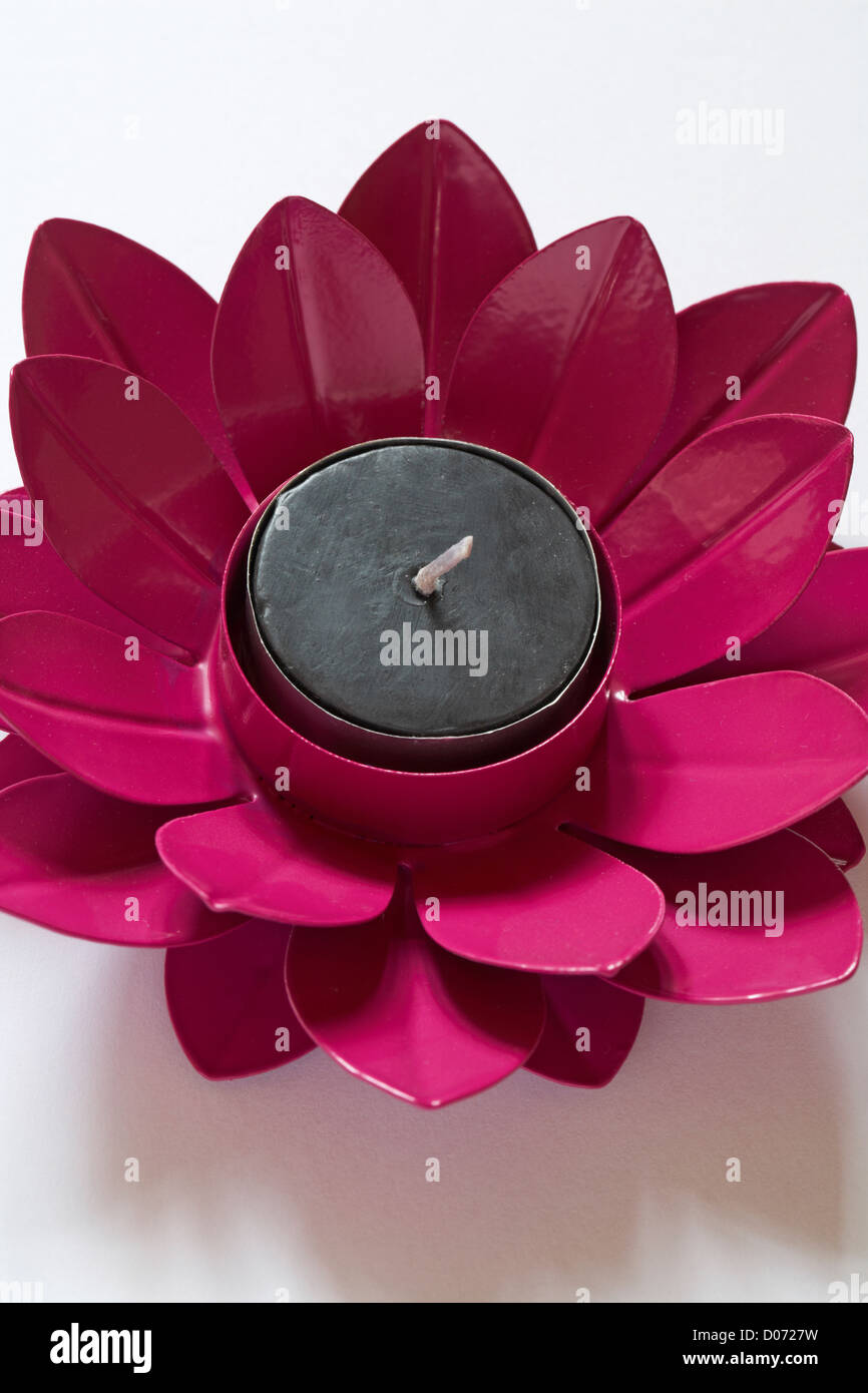 pink flower candle holder with black tealight candle, tea light candle