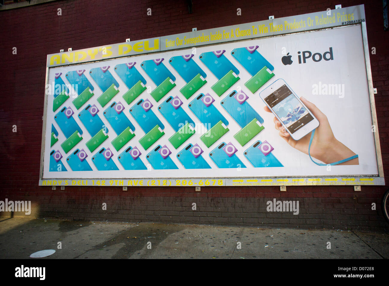 Advertising for the Apple's line of iPods on a billboard in the Chelsea neighborhood of New York Stock Photo