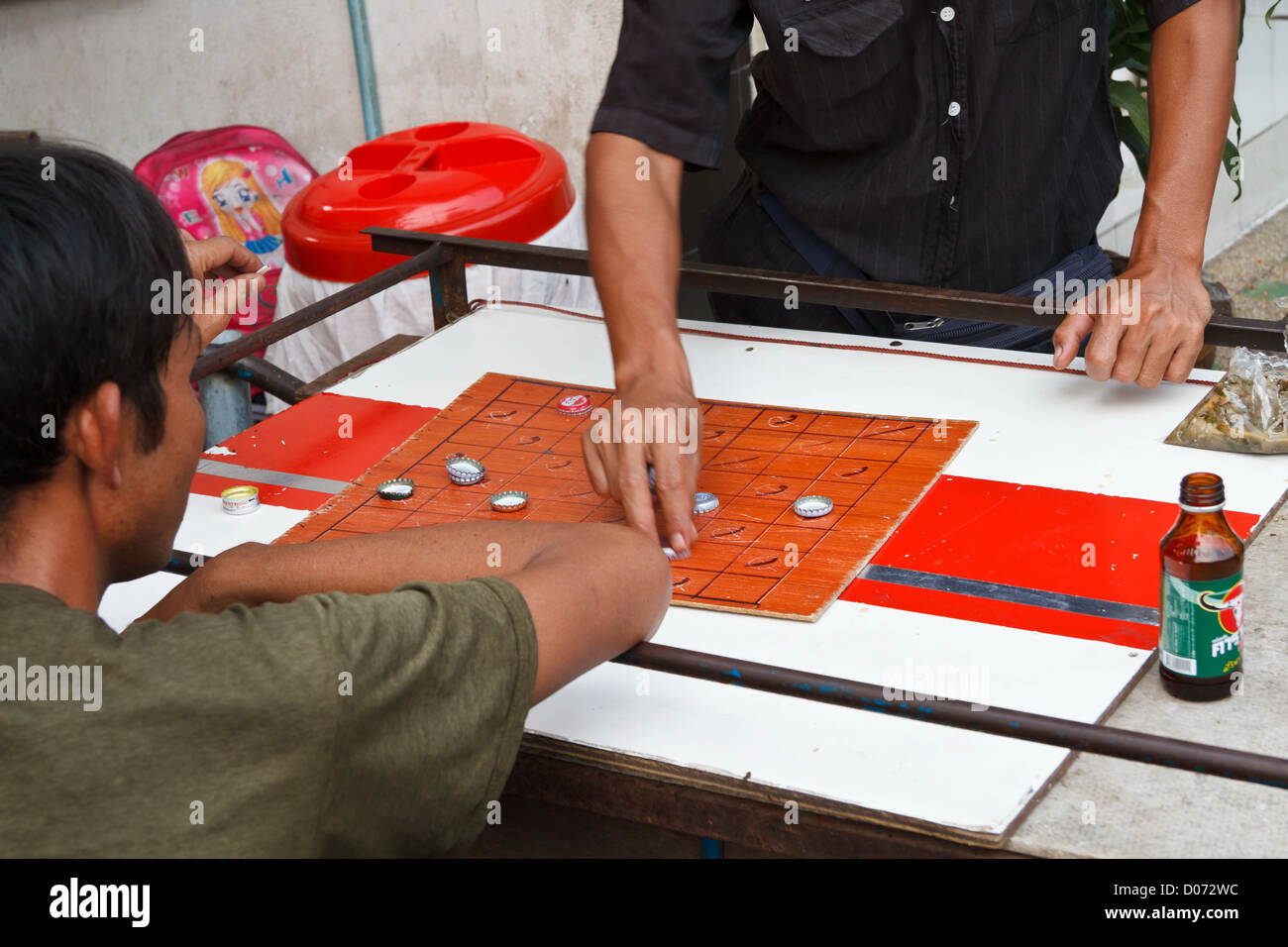 Playing a Board Game in Bangkok, Thailand Stock Photo Alamy