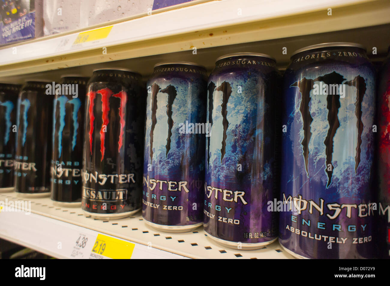 Monster brand energy drinks on a supermarket shelf in New York Stock