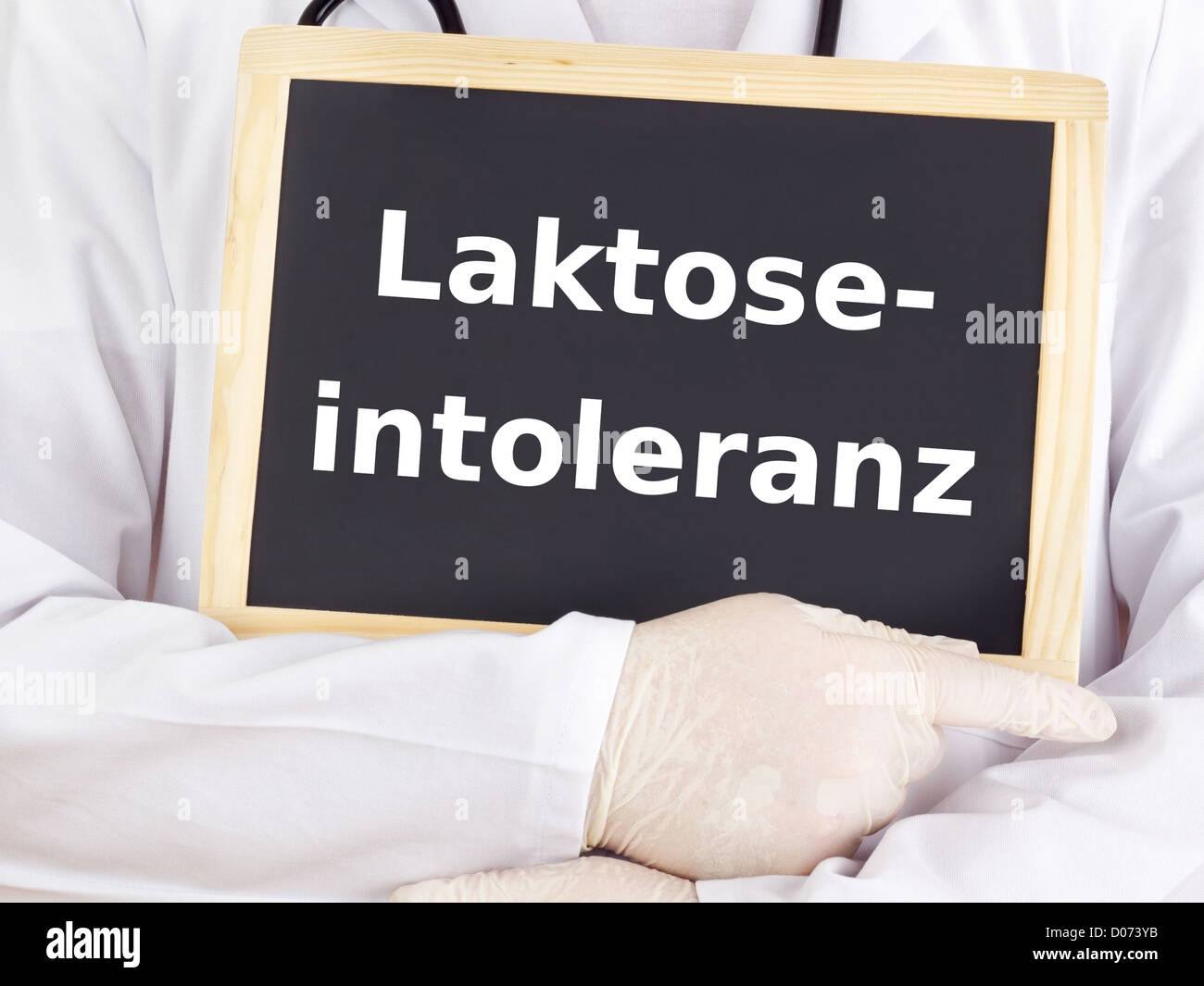 Doctor shows information lactose intolerance Stock Photo Alamy