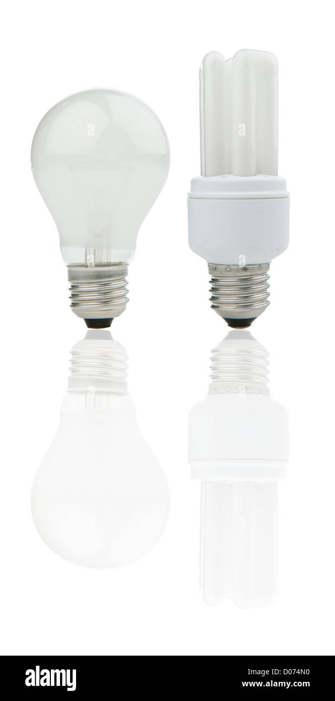 Old and new light bulbs together, reflection and white background Stock