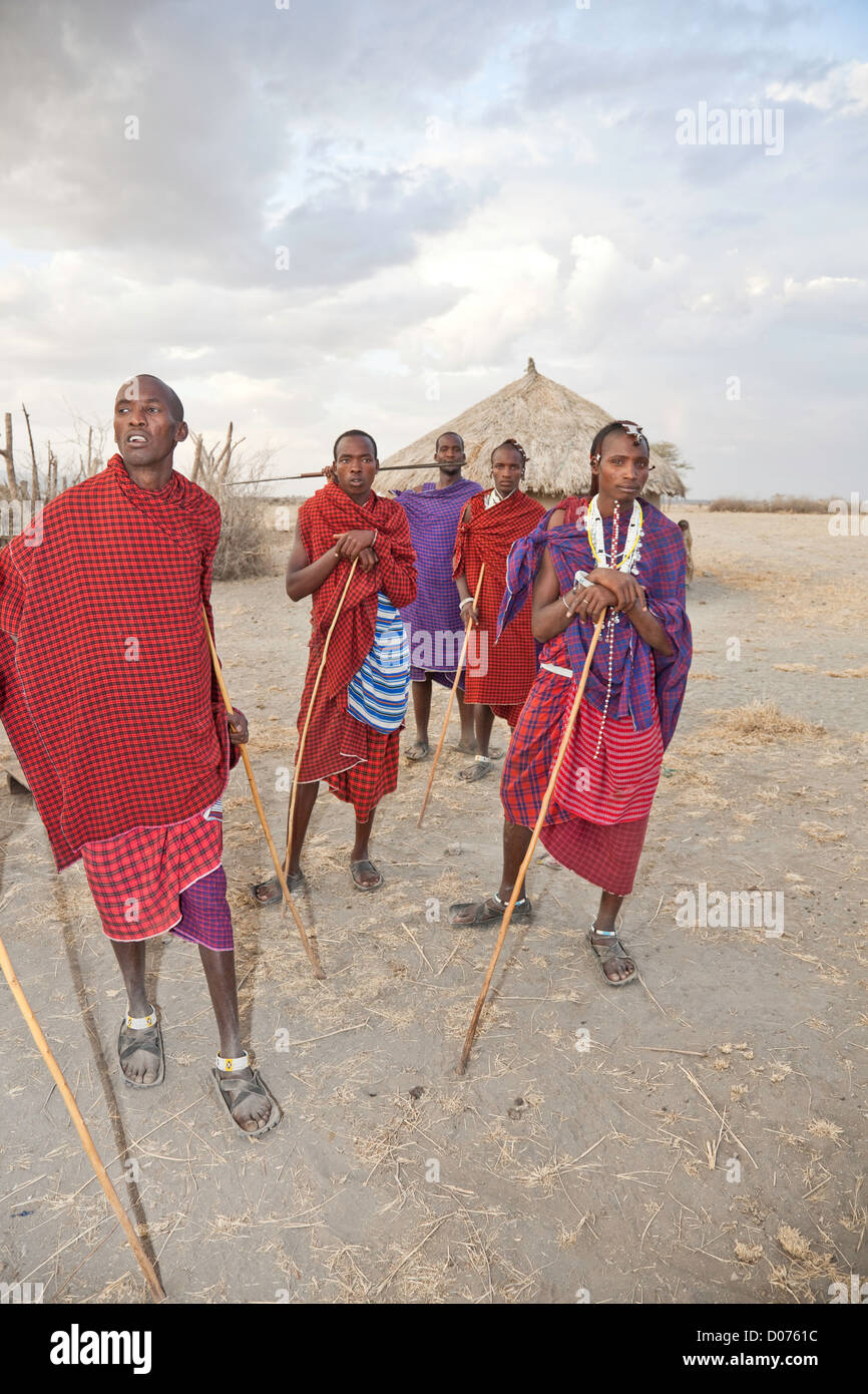 Group of five Maasai worriers at Tanzania;East Africa;Africa;Authentic Cultural Village in Olpopongi;Maasai Men Worrier Stock Photo