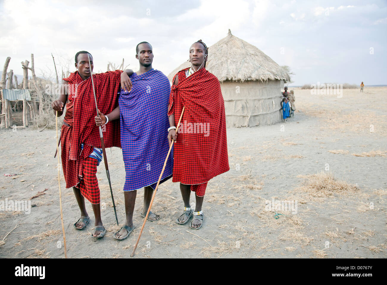 Three Maasai Worriers at Tanzania;East Africa;Africa;Authentic Cultural Village in Olpopongi;Maasai Men Worrier Stock Photo