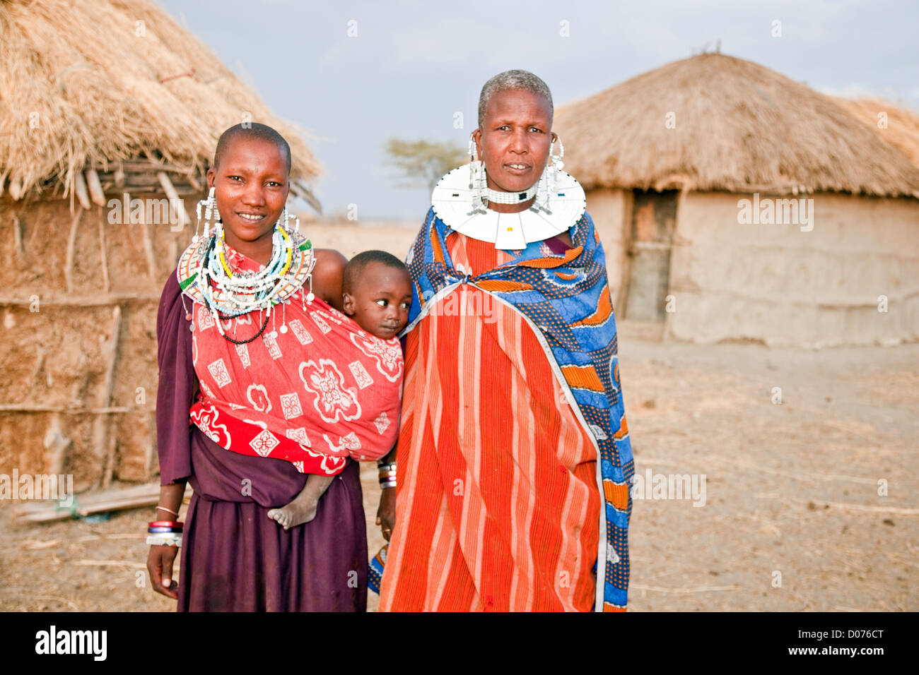 Three Generation of Maasai Women with babies in Tanzania;East Africa;Africa;Authentic Cultural Village in Olpopongi;Maasai Stock Photo
