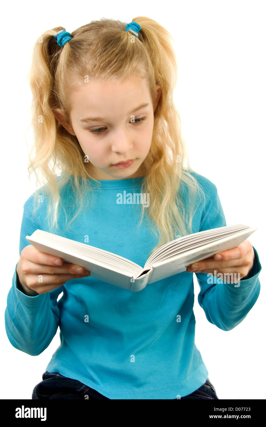 Young girl is reading a book over white background Stock Photo - Alamy