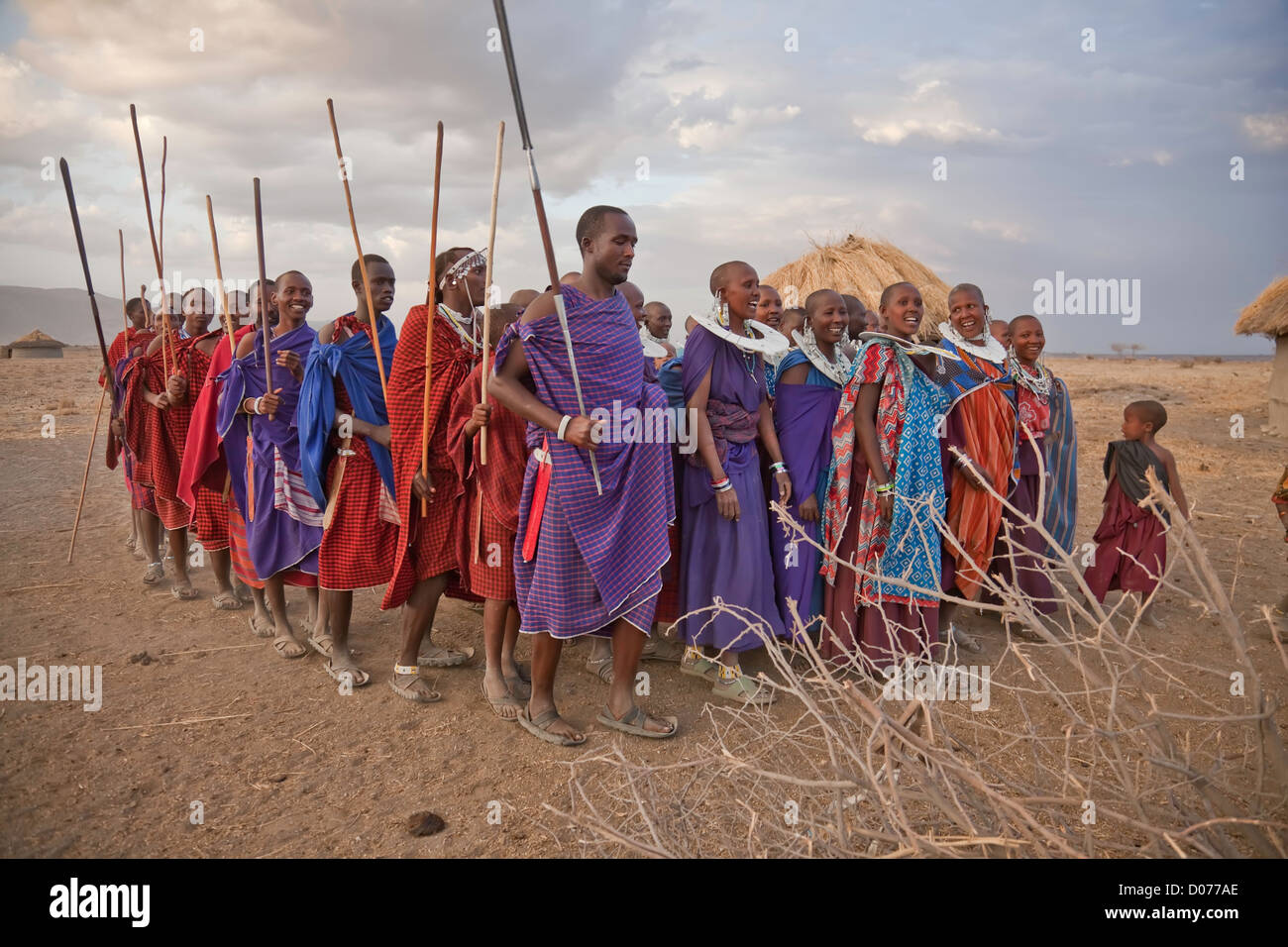 A group of Maasai men and women performing a dance at Tanzania;East Africa;Africa;Authentic Cultural Village in Olpopongi;Maasai Stock Photo