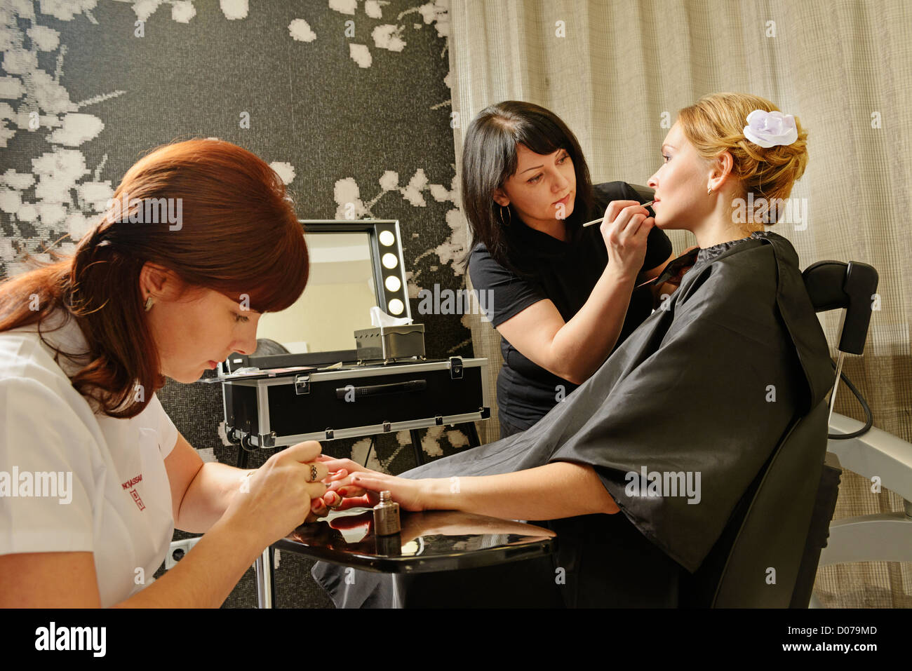 [Three People] client woman procedure manicure spa Stock Photo