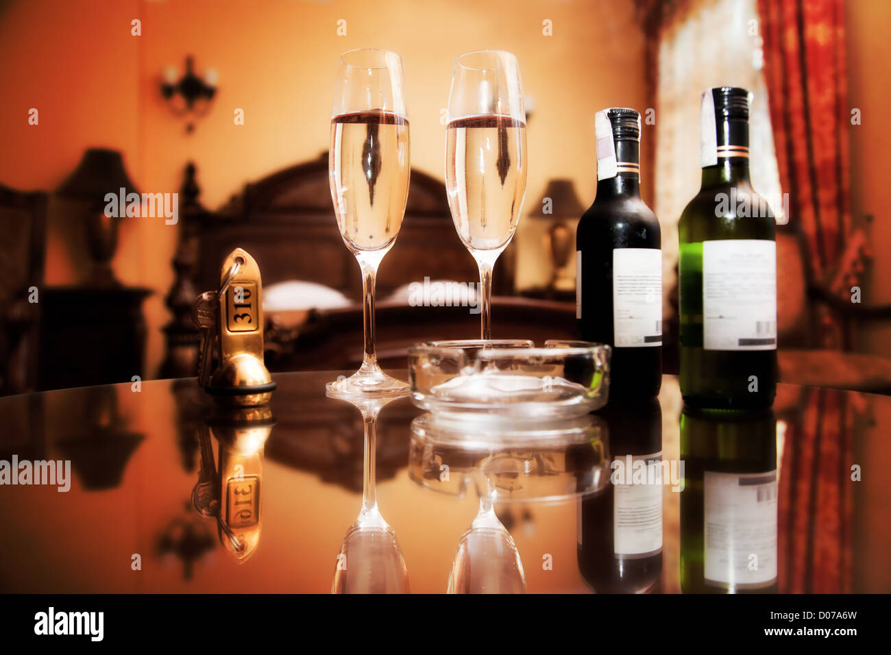 Luxury interior hotel room with elegant service. Wine, glasses