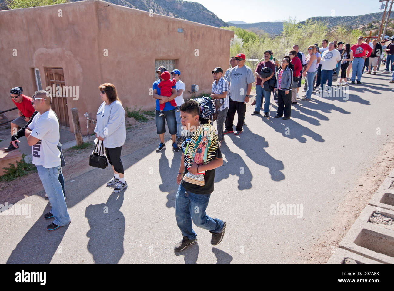 USA, New Mexico, Chimayo, Pilgrims on their way to the Chimayo Sanctuary during Easter