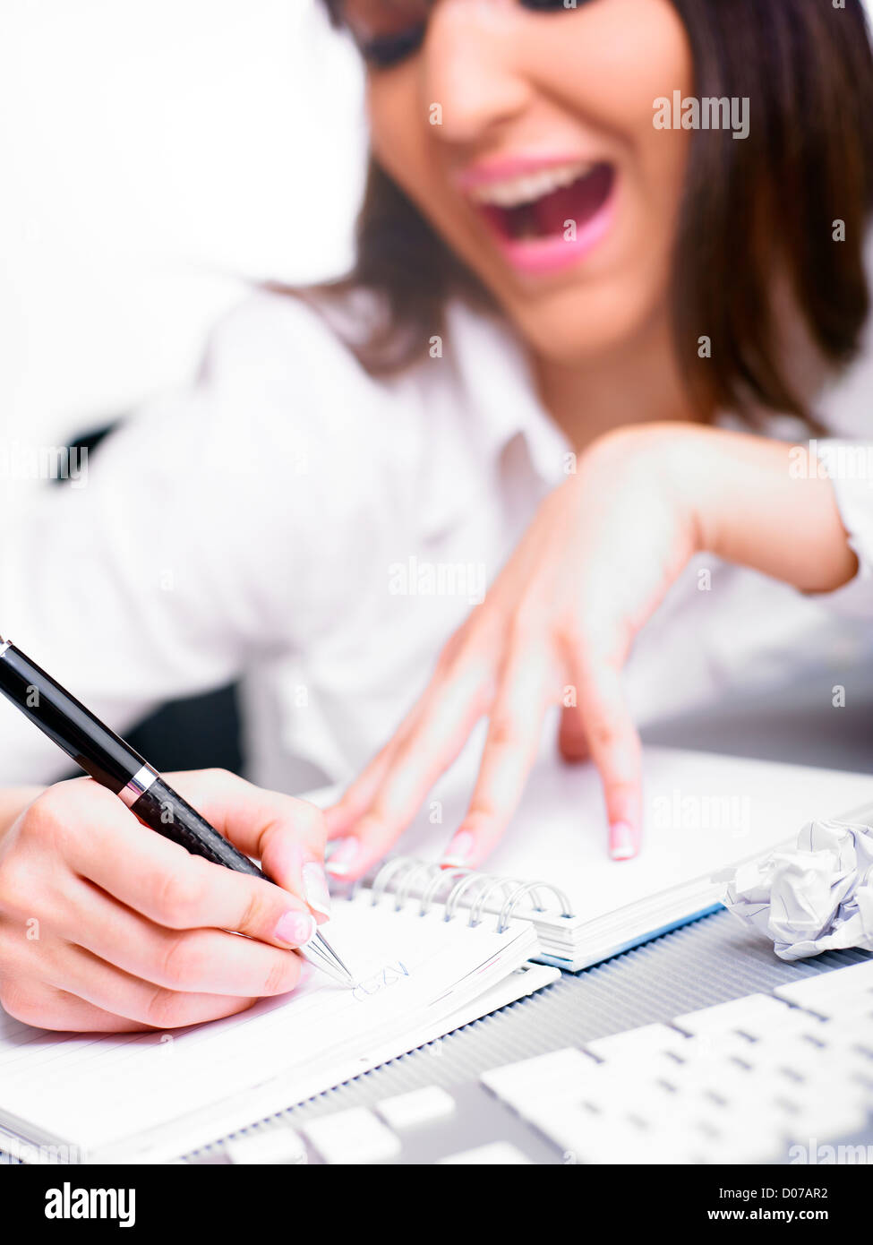 Happy Business Woman Writing Stock Photo - Alamy