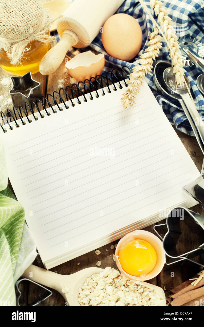 Open notebook and fresh ingredients Stock Photo