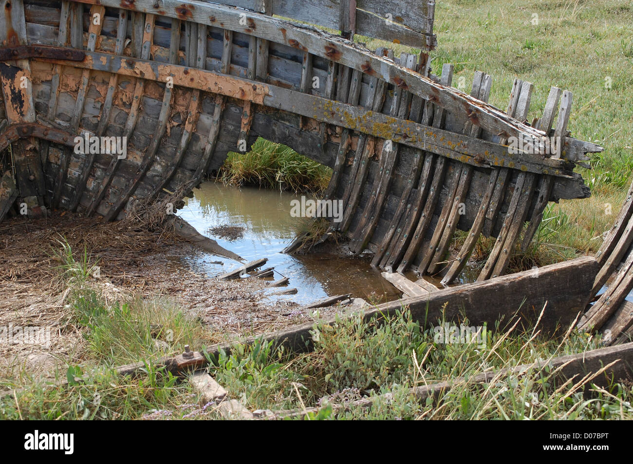 Remains of a wrecked wooden boat, Blakeney, Norfolk, UK Stock Photo