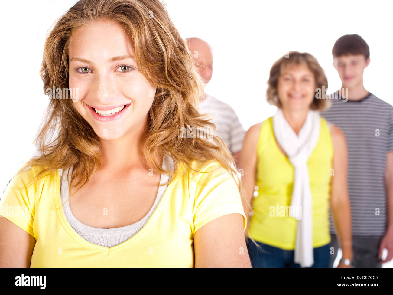 Gorgeous woman in focus with her mom in the background isolated on ...