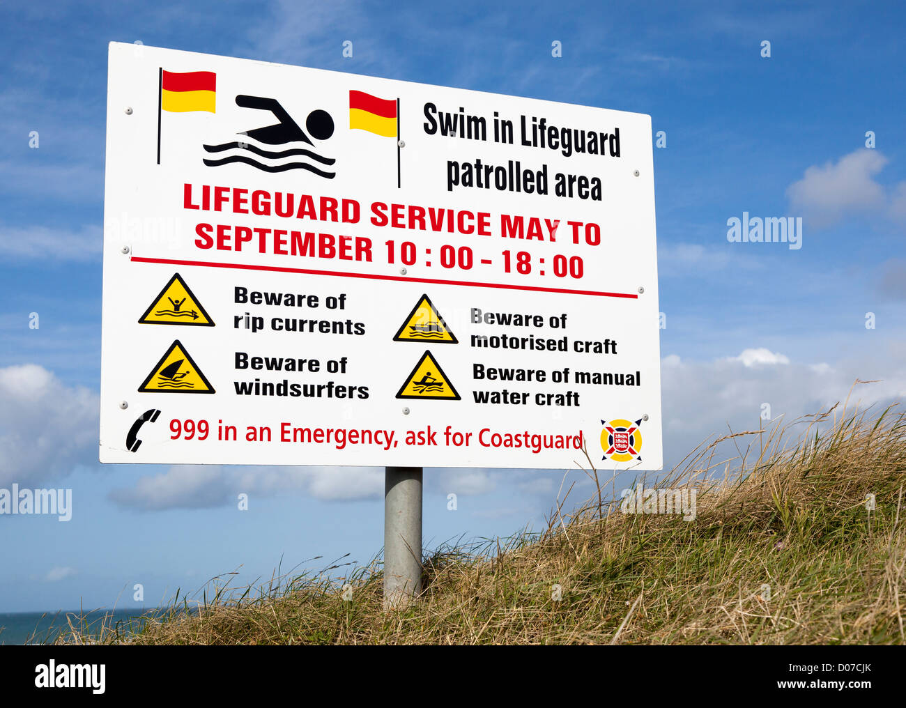 Swim in lifeguard patrolled area sign, St Ouen's Bay, La Baie de St Ouen, Jersey west coast, Channel Islands, UK Stock Photo
