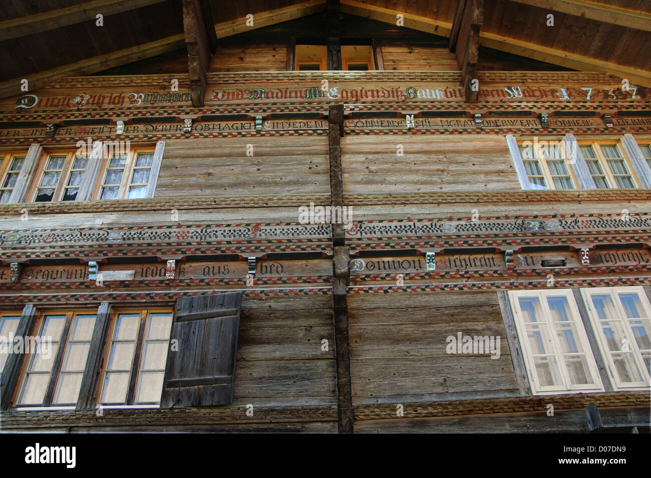 Swiss woodcarving on house front Stock Photo