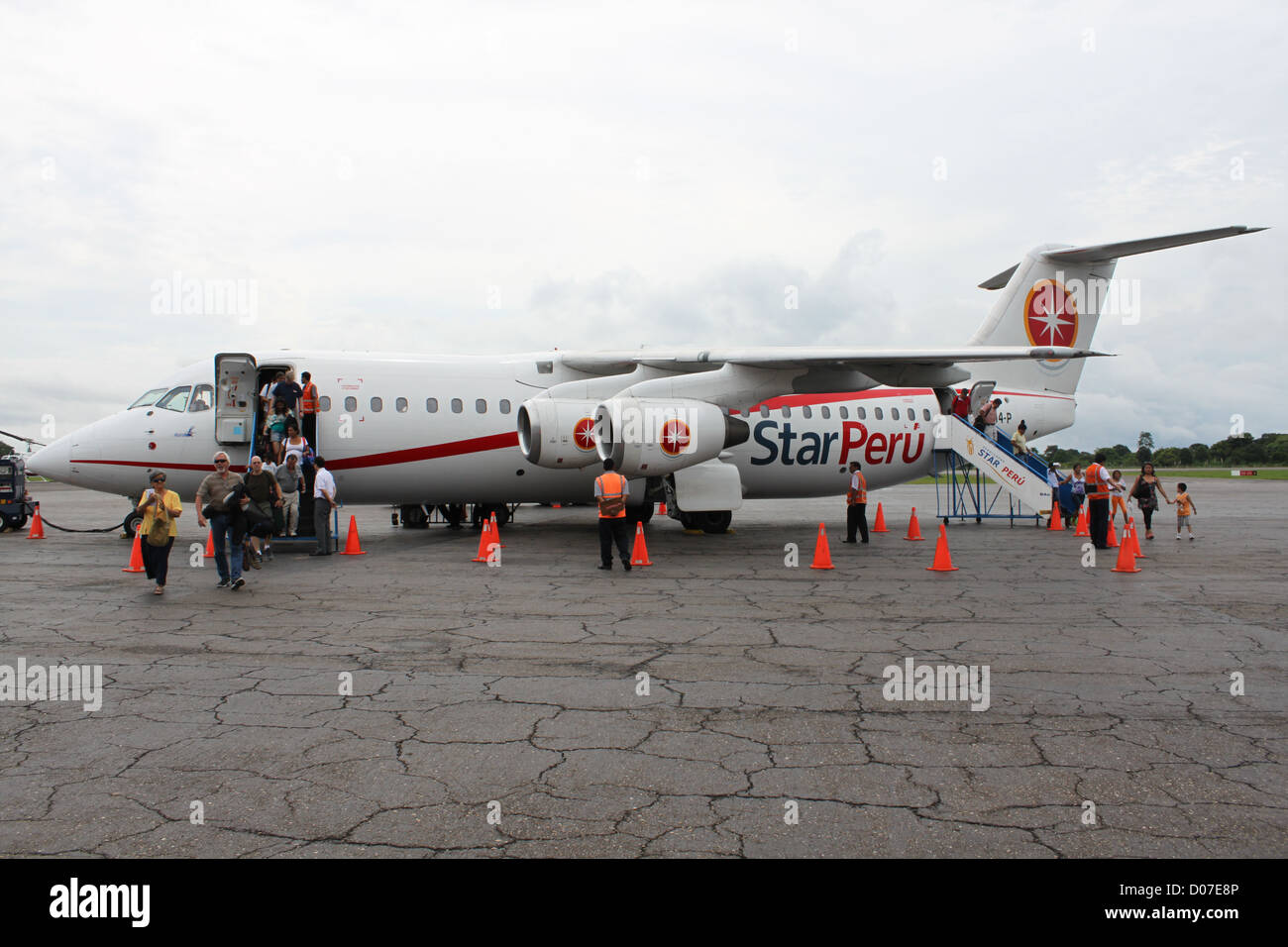 People getting off airplane in South America Stock Photo - Alamy