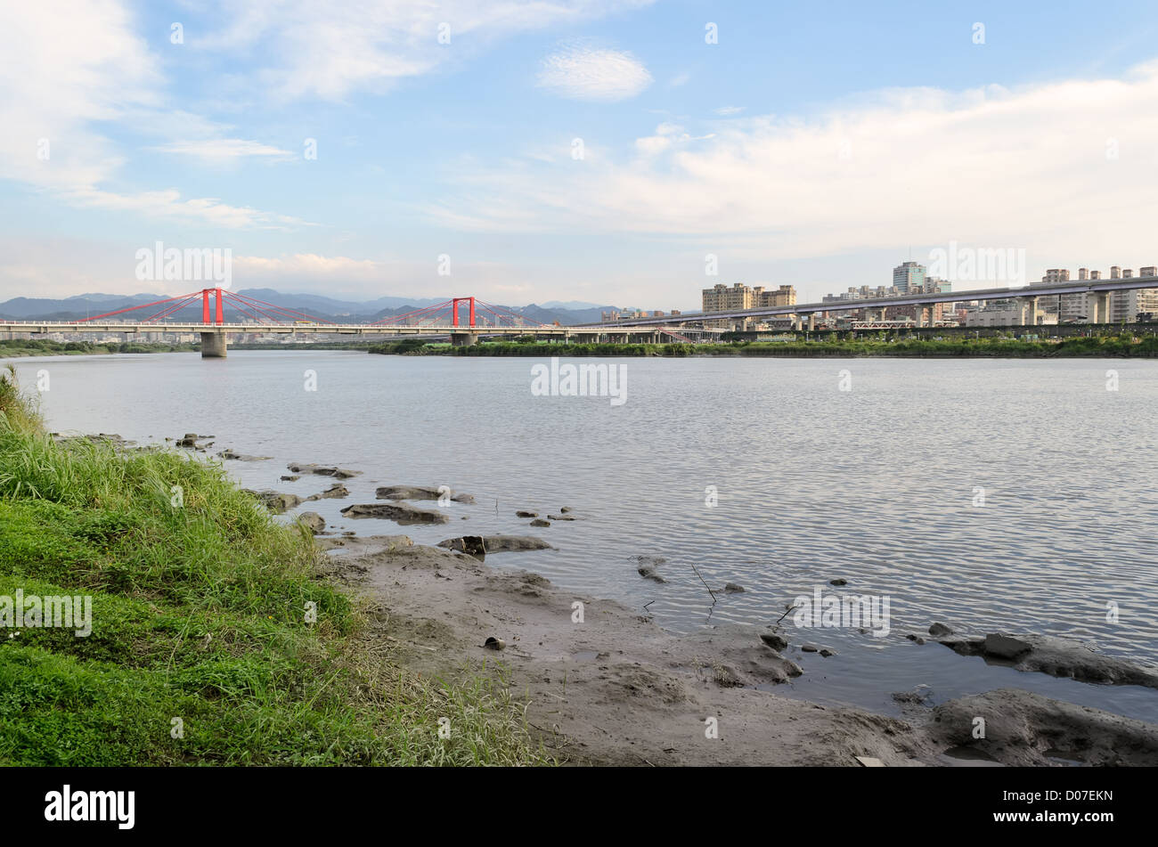 River in city under blue with bridge far away in Taipei, Taiwan, Asia. Stock Photo