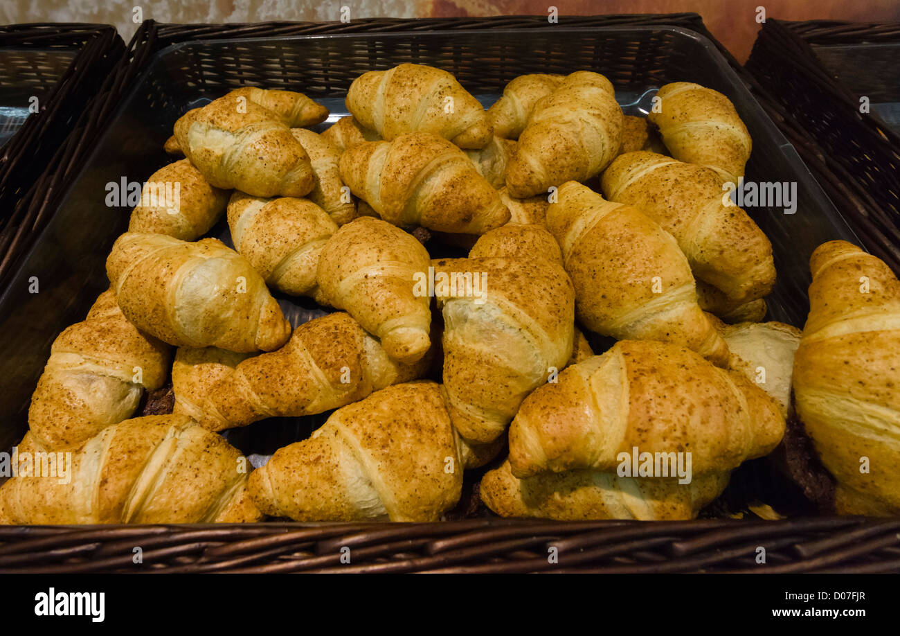 Breakfast chocolate croissants fresh from LIDL UK store in-store bakery. Stock Photo