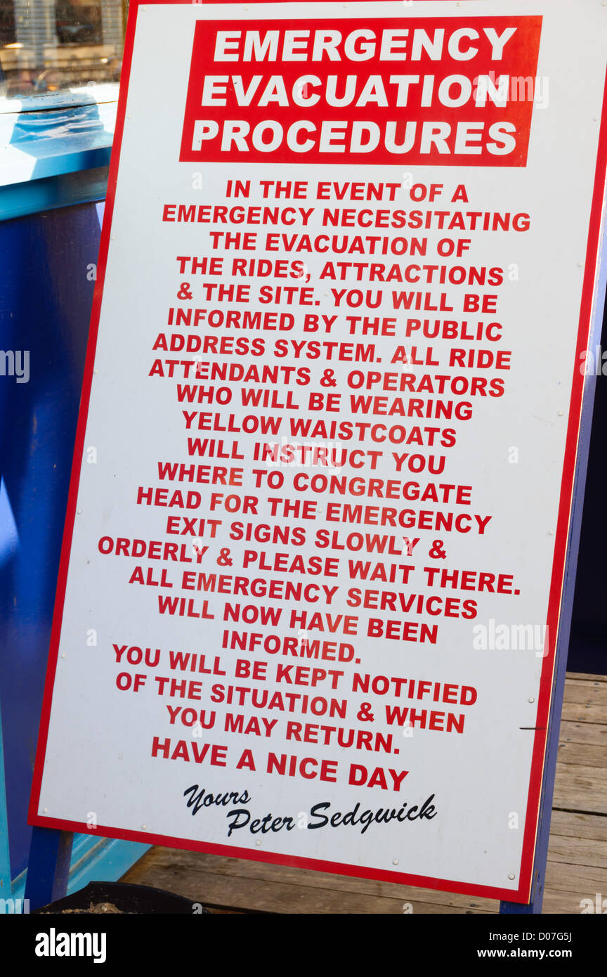 Blackpool, Lancashire, UK's top amusement and fun seaside resort - Emergency Evacuation notice on central pier. Stock Photo